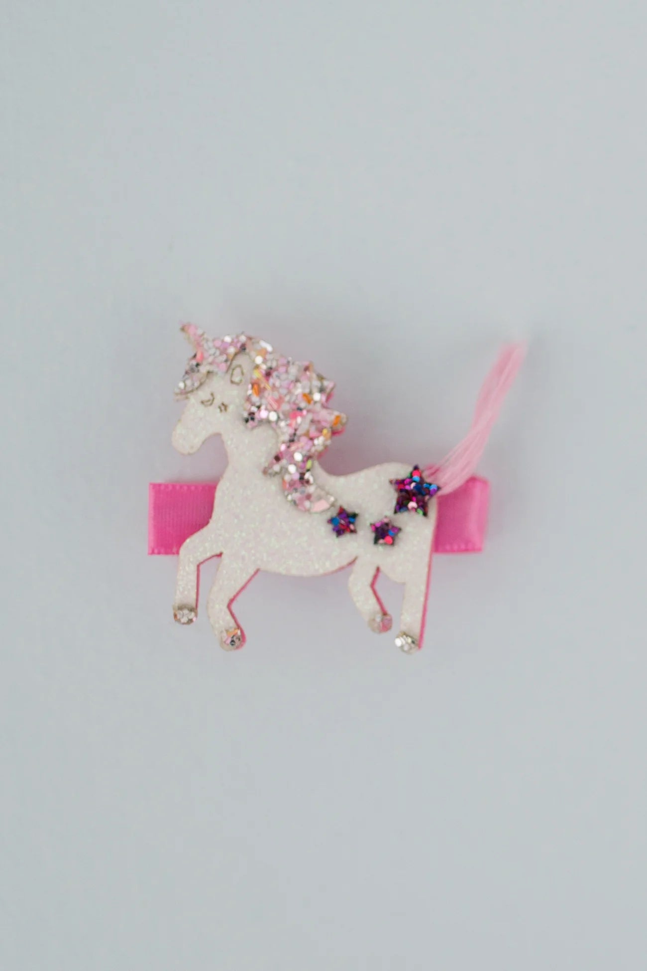 BOUTIQUE TASSY TAIL UNICORN HAIRCLIP